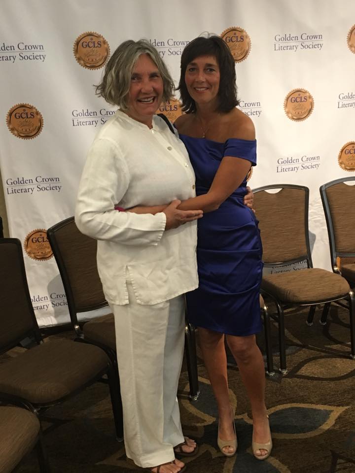 with jody in front of award backdrop