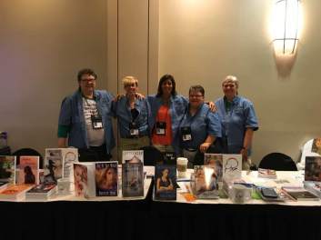 affinity gang in front of table